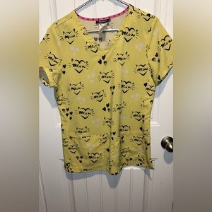 Yellow HeartSoul v neck scrub top. Size medium. Pitter-patter material